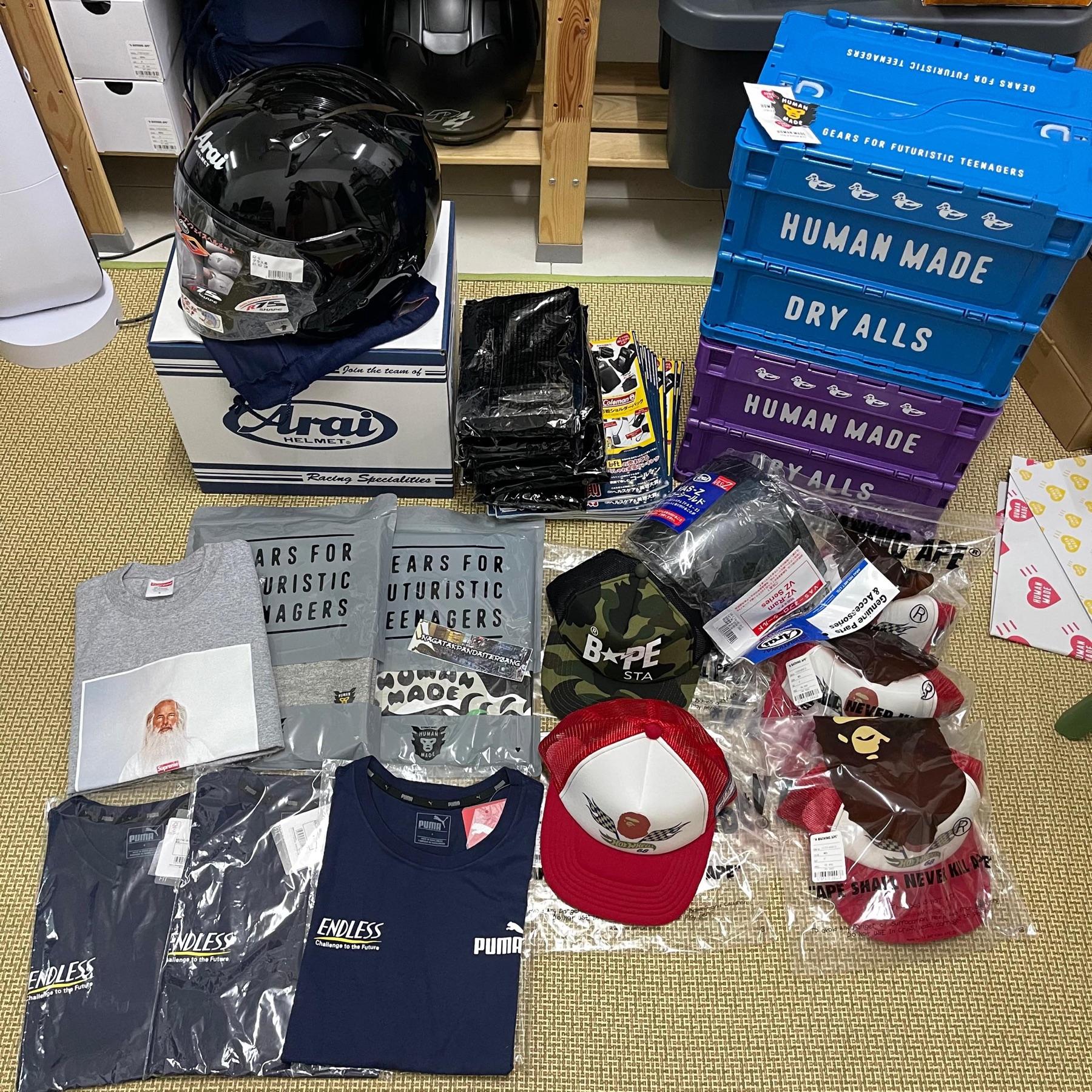 Black Arai helmet, Human Made blue and purple storage crates, BAPE trucker caps, Puma Endless tees and Supreme Rick Rubin tee