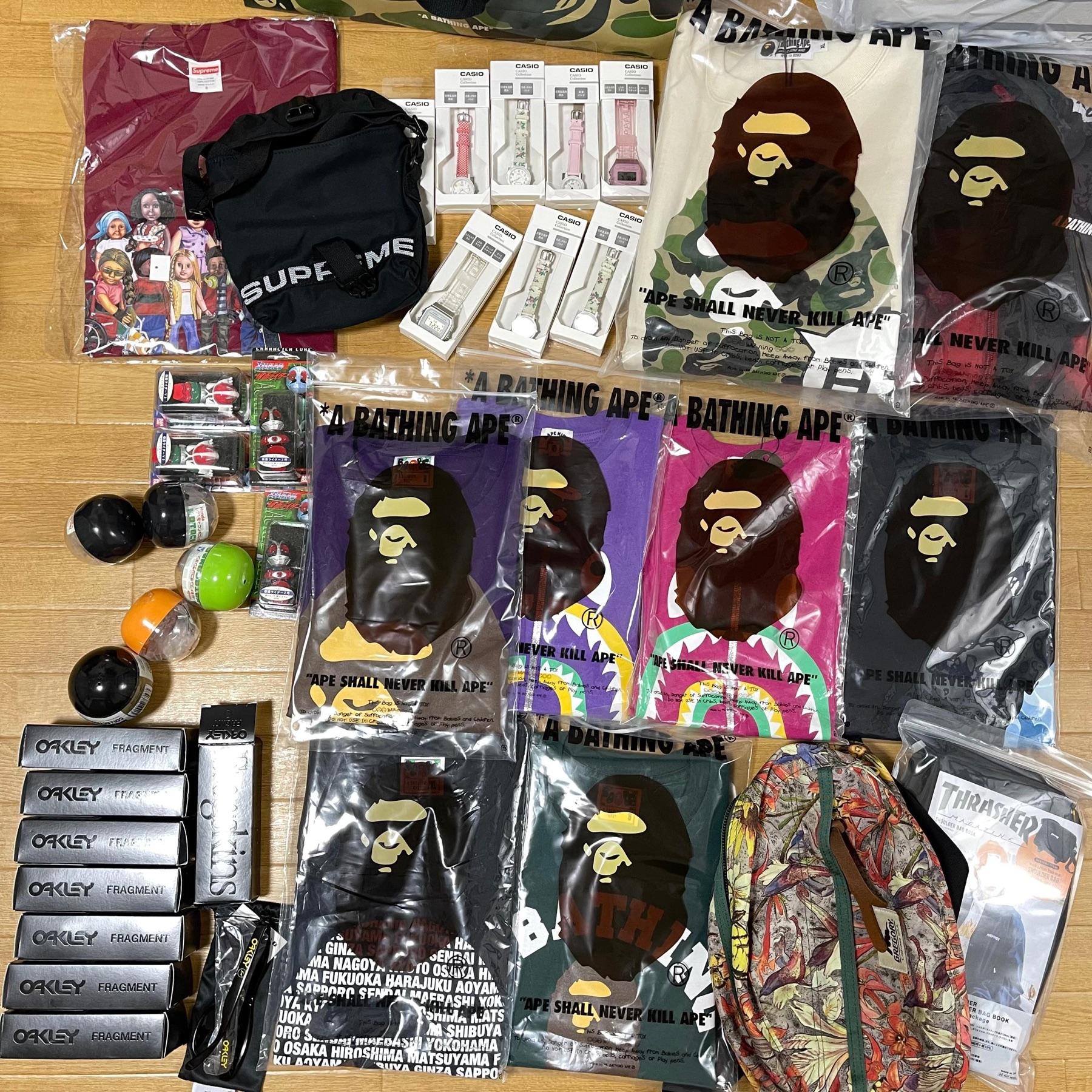BAPE tees in purple, pink and camo, Casio watches, Oakley x Fragment boxes, Supreme shoulder bag, Gregory floral bag and Thrasher bag